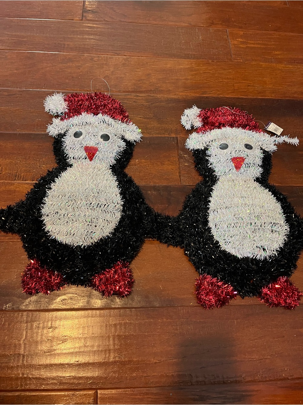 Festive Penguin Tinsel Pair with Santa Hats